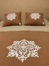 Pie de cama y almohadones