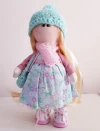 muñeca de tela estilo rusa.