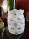 Frasco con funda tejida a crochet