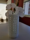 Frasco con funda tejida a crochet