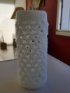 Frasco con funda tejida a crochet