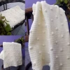 Manta con pelotitas