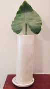 florero de cerámica con platito
